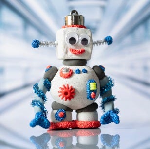 Collagebild - Robot gjord av stenlera