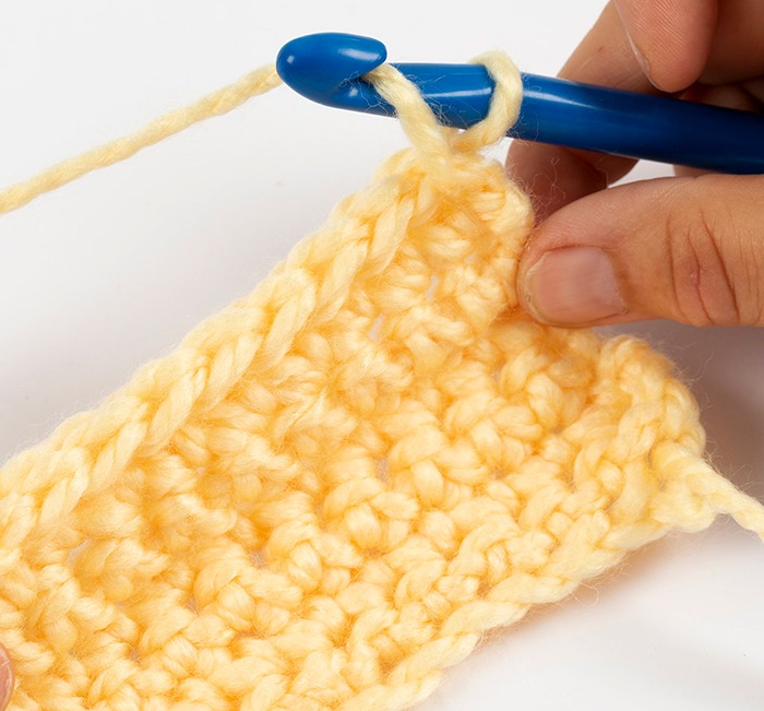 Person crochet a sample