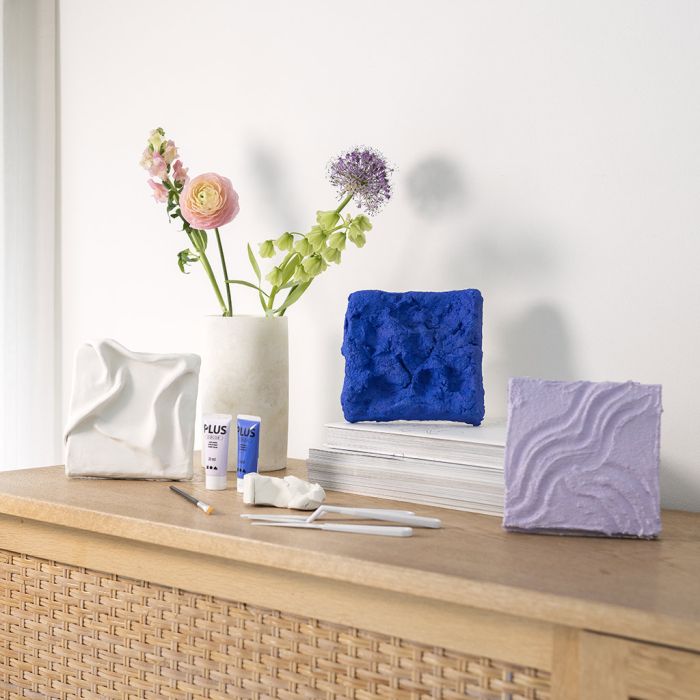 3D-väggkonst av tre olika material och tekniker