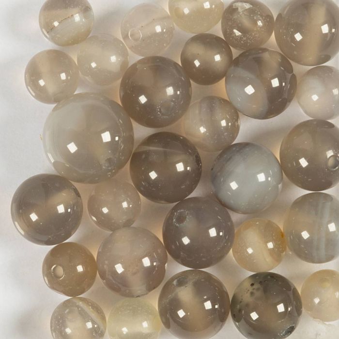 Pärlor av agatsten, Dia. 6+8+10 mm, Hålstl. 0,9-1 mm, transparent grå, 28 st./ 1 förp.