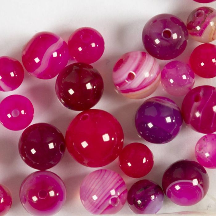 Pärlor av agatsten, Dia. 6+8+10 mm, Hålstl. 0,9-1 mm, rosa, 28 st./ 1 förp.