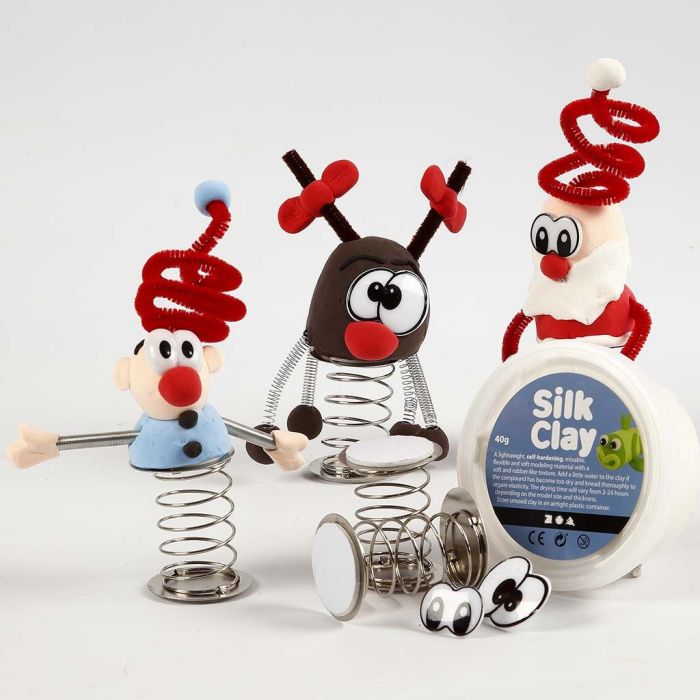 Julfigur av Silk Clay på fjäder
