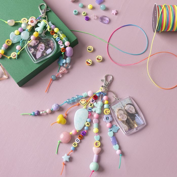 Charm med bild och pärla