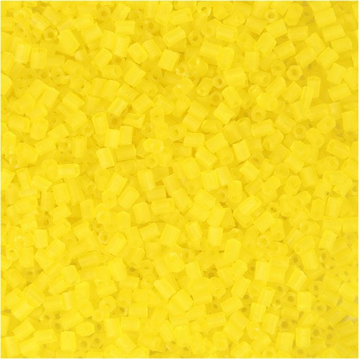 Rocaipärlor 2-cut, Dia. 1,7 mm, stl. 15/0, Hålstl. 0,5 mm, transparent gul, 25 g/ 1 förp.
