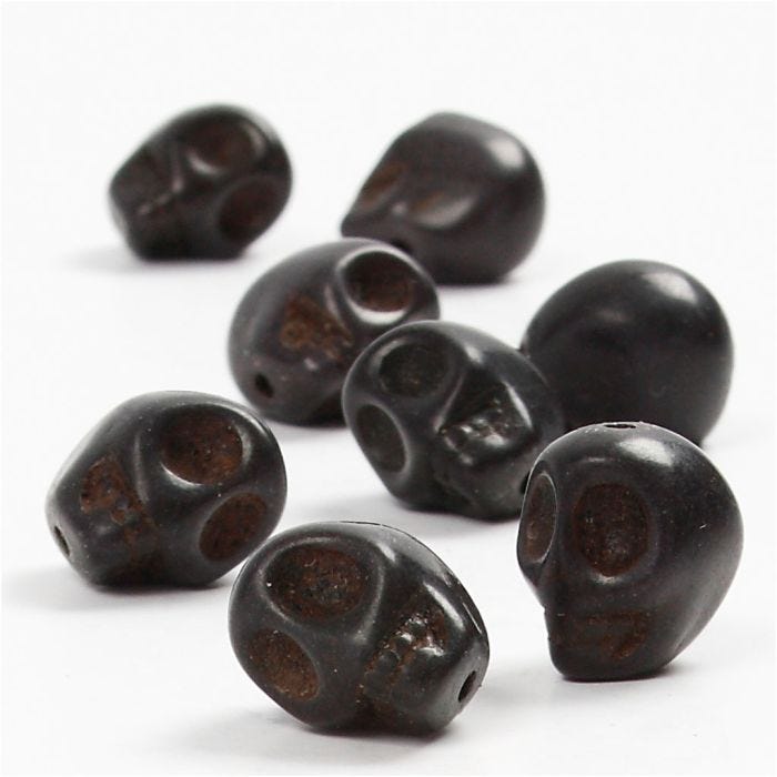 Howlite, Dia. 12 mm, Hålstl. 1,5 mm, svart, 32 st./ 1 förp.
