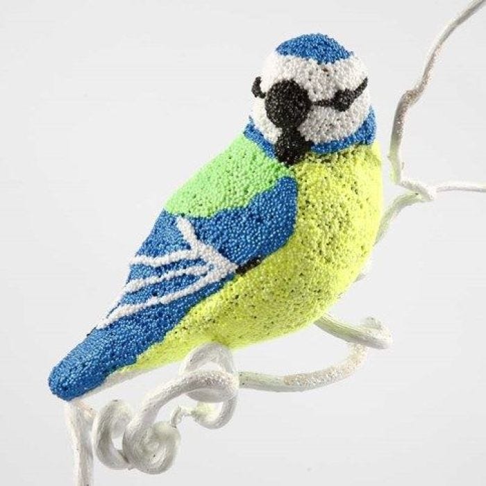 Fågel i papier-maché, klädd med Foam Clay