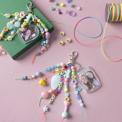 Charm med bild och pärla