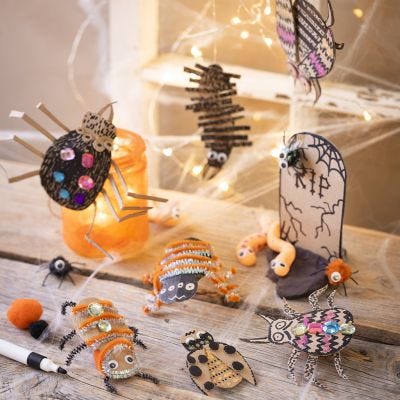 Halloweenkyrkogård med insekter