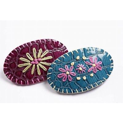 Hårspännen i ormskinn