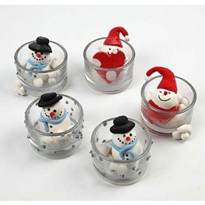 Figurer av Silk Clay i värmeljushållare