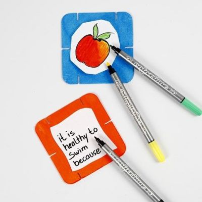 Dekorerade konstruktionsbrickor av vitt papp