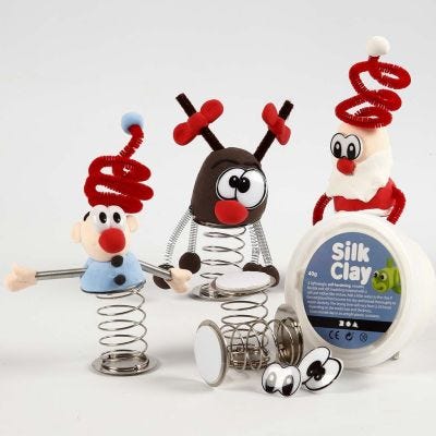 Julfigur av Silk Clay på fjäder