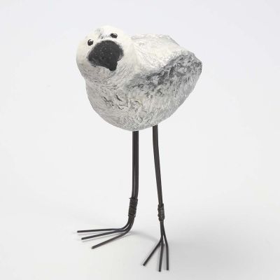 Långbent fågel av frigolit klädd med pulp