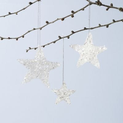 Glittriga stjärnor av Sticky Base och glitter.