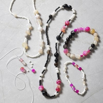 Armband och halsband med agater pärlor