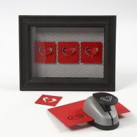 Hjärtan av kartong i 3D-ram med glas