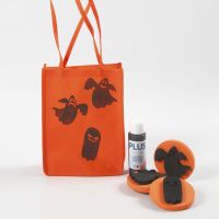 Orange påse till Halloween dekorerad med motiv